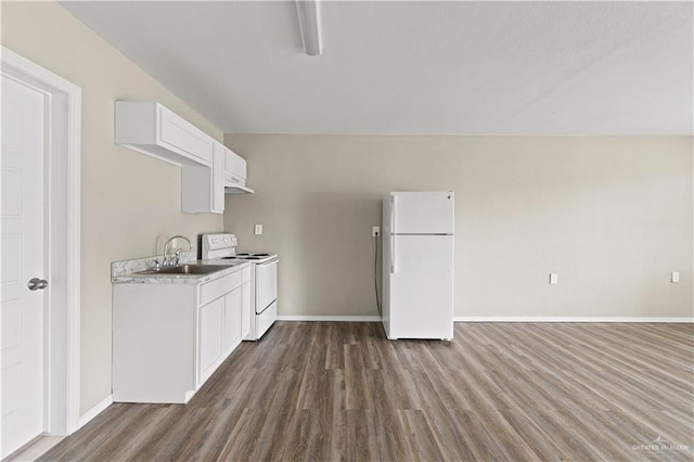 kitchen featuring sink, white cabinets, white appliances, and hardwood / wood-style flooring