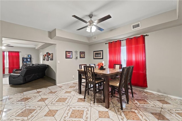 dining space featuring hardwood / wood-style flooring and ceiling fan