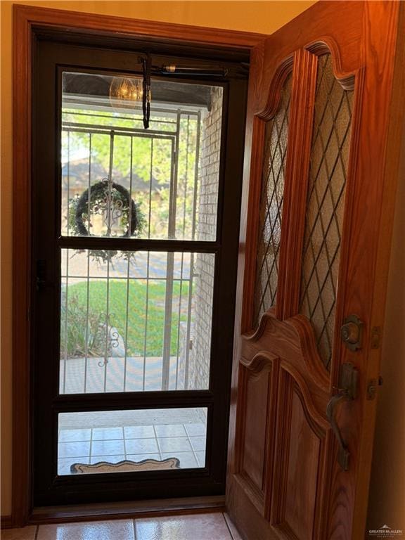 2303 Viola St, Mission, TX 78574 - doorway with an inviting chandelier