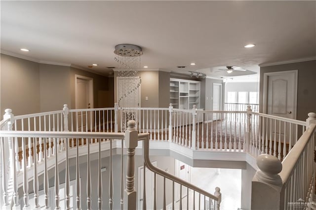 hall featuring ornamental molding, an upstairs landing, and recessed lighting