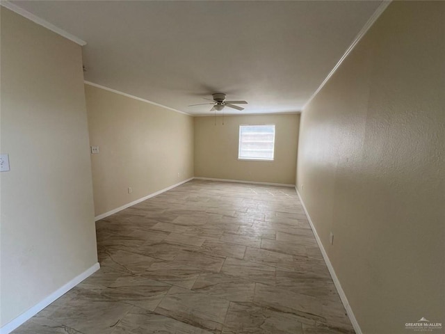 empty room featuring ornamental molding, ceiling fan, and baseboards