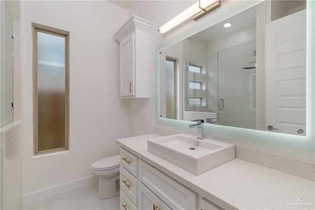 bathroom featuring toilet, walk in shower, tile patterned floors, and vanity