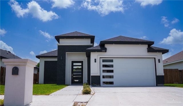 prairie-style home with a garage