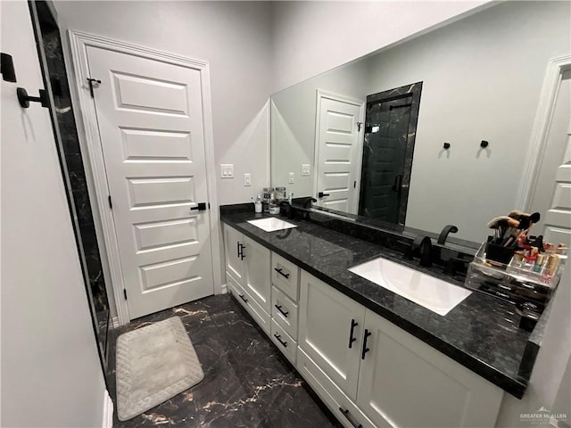 1213 Emma Elizabeth St, Weslaco, TX 78599 - bathroom with double vanity, marble finish floors, and a stall shower