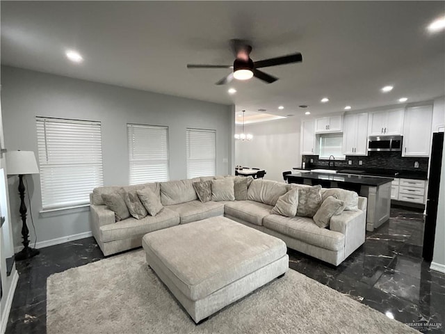 1213 Emma Elizabeth St, Weslaco, TX 78599 - living area featuring ceiling fan, recessed lighting, and a chandelier