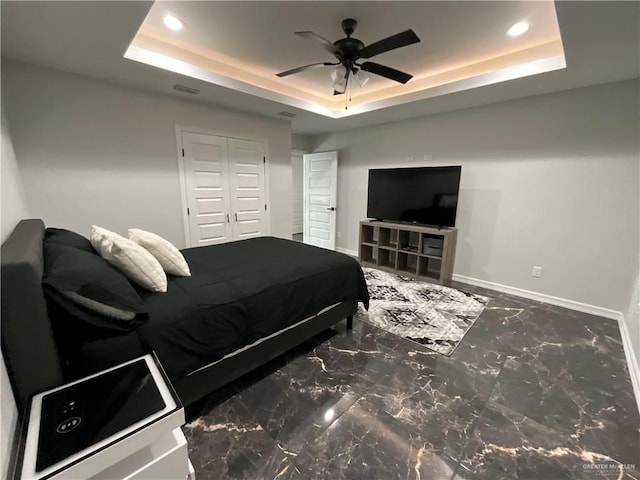 1213 Emma Elizabeth St, Weslaco, TX 78599 - bedroom featuring a raised ceiling, recessed lighting, marble finish floors, a closet, and ceiling fan