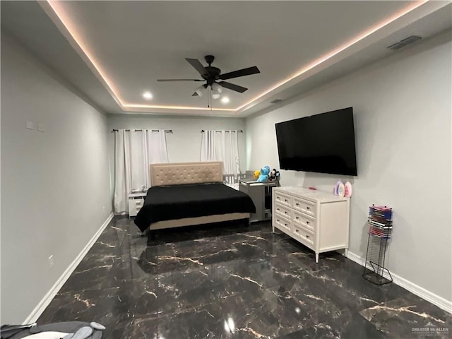 1213 Emma Elizabeth St, Weslaco, TX 78599 - bedroom featuring a tray ceiling, marble tiled floors, and ceiling fan