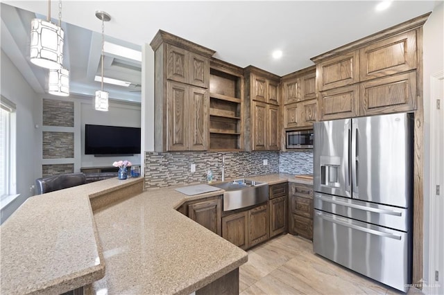 kitchen featuring stainless steel appliances, a sink, open floor plan, backsplash, and open shelves