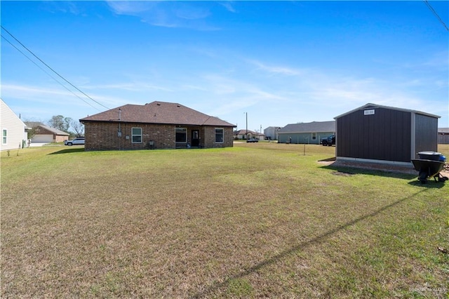 view of yard with an outdoor structure and a storage shed