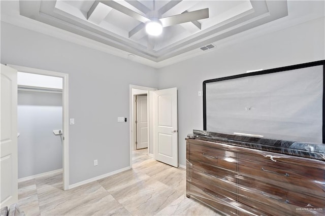 bedroom featuring visible vents, a high ceiling, ceiling fan, coffered ceiling, and baseboards