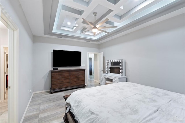 bedroom with beam ceiling, coffered ceiling, a ceiling fan, and baseboards