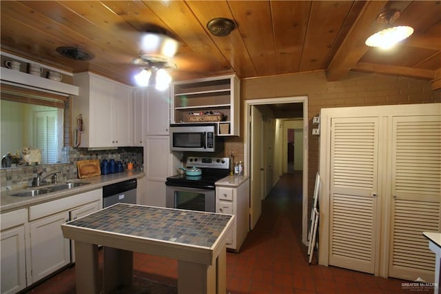 kitchen featuring a sink, butcher block countertops, appliances with stainless steel finishes, wooden ceiling, and open shelves