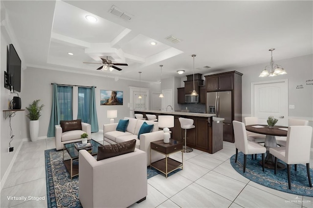 1041 Arroyo Cir, Mercedes, TX 78570 - living room with coffered ceiling, a chandelier, a ceiling fan, recessed lighting, and beam ceiling
