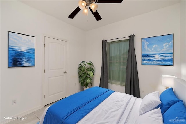1041 Arroyo Cir, Mercedes, TX 78570 - bedroom featuring baseboards and ceiling fan