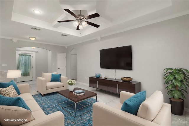 1041 Arroyo Cir, Mercedes, TX 78570 - living room with arched walkways, coffered ceiling, a ceiling fan, ornamental molding, and beam ceiling