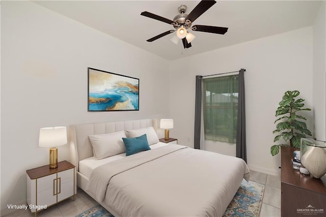 1041 Arroyo Cir, Mercedes, TX 78570 - bedroom with light tile patterned floors, baseboards, and ceiling fan