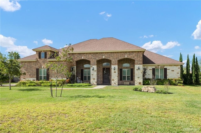 view of front of home with a front yard