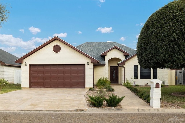 view of front of property featuring a garage