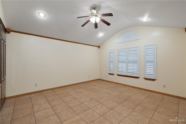 unfurnished room featuring vaulted ceiling and ceiling fan