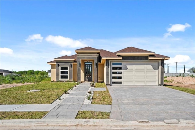 prairie-style house with a garage