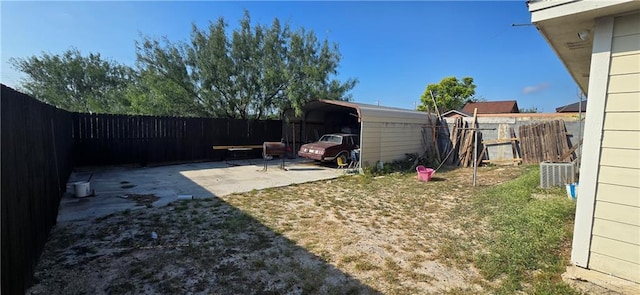 view of yard with a carport