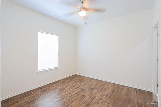 1046 Hidalgo St, Mercedes, TX 78570 - unfurnished room with wood finished floors, a ceiling fan, and baseboards