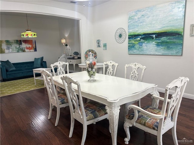 824 Lucy Dr, Alamo, TX 78516 - dining space with dark wood-style flooring