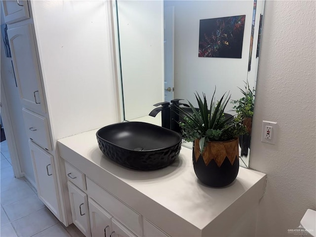 824 Lucy Dr, Alamo, TX 78516 - bathroom with tile patterned flooring and vanity