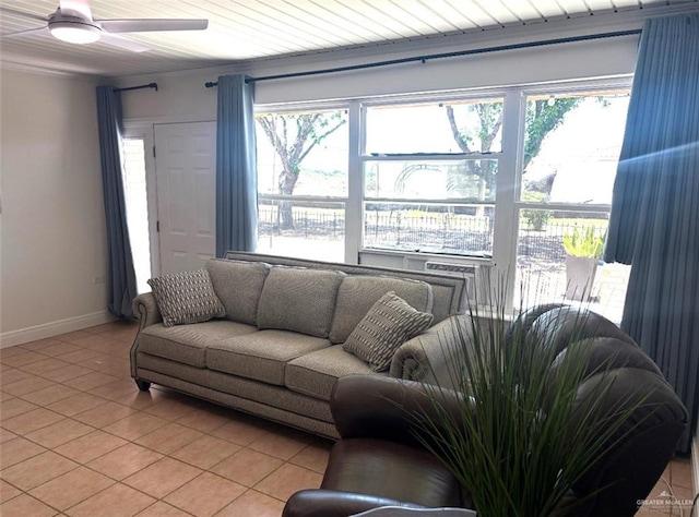 824 Lucy Dr, Alamo, TX 78516 - living area with light tile patterned floors, baseboards, and a ceiling fan