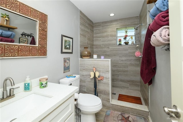 4511 Abbey St, Mercedes, TX 78570 - full bathroom featuring a walk in shower, toilet, vanity, and recessed lighting
