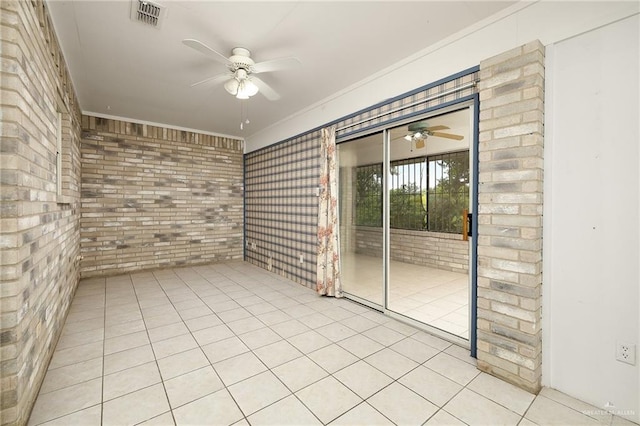1711 Sun St, Mission, TX 78572 - unfurnished sunroom with a ceiling fan