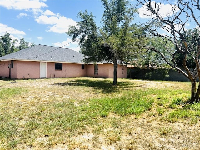 4407 Alejandro St, Mission, TX 78573 - back of property featuring stucco siding