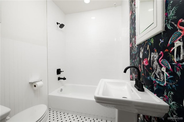 1315 Kendlewood Ave, Mcallen, TX 78501 - full bathroom with toilet, a sink, tub / shower combination, and tile patterned floors