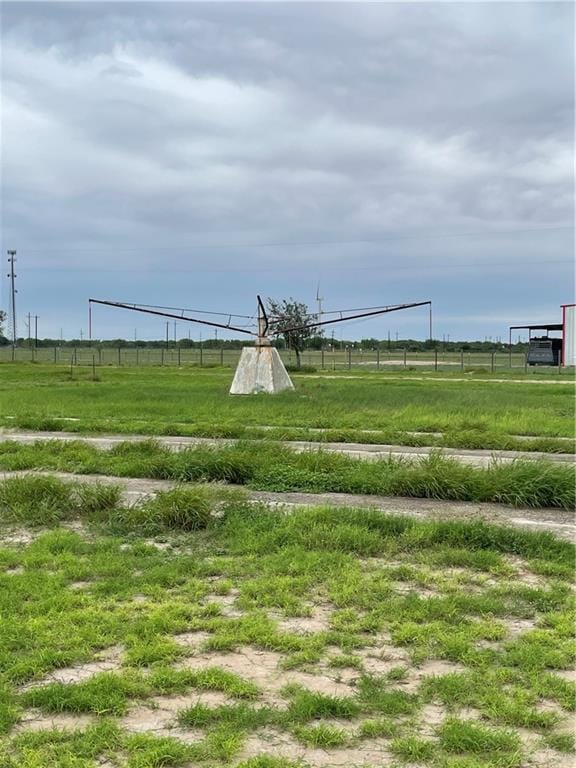 view of yard with a rural view