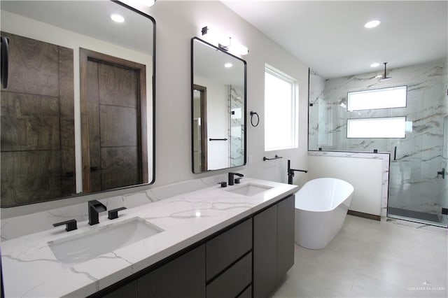 bathroom with vanity and plus walk in shower