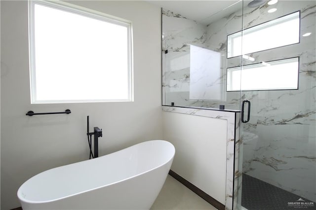 bathroom with independent shower and bath