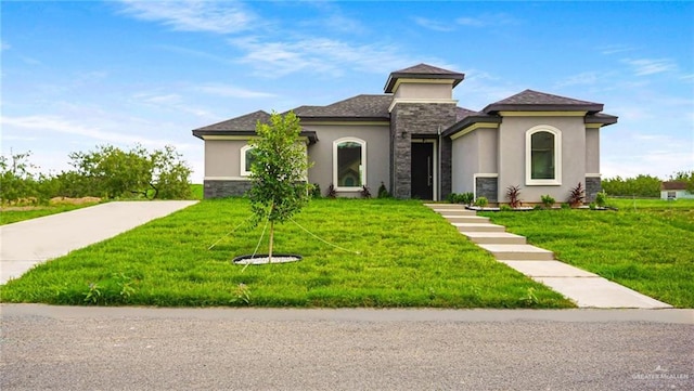 view of front of property with a front lawn