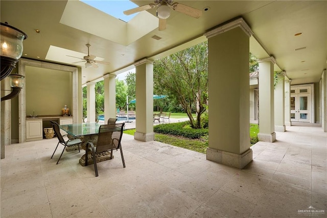 view of patio with ceiling fan