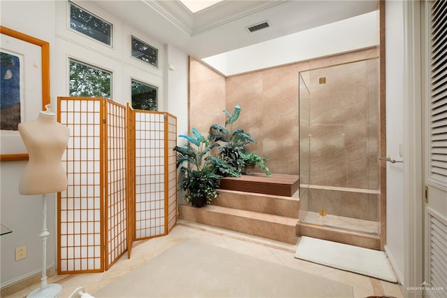 bathroom with tile patterned floors and ornamental molding