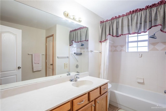 bathroom with shower / tub combo and vanity