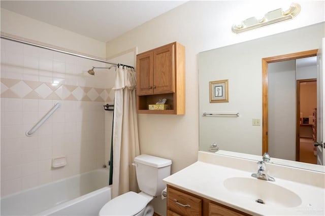 full bathroom featuring vanity, toilet, and shower / tub combo