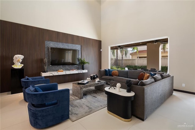 living room with a towering ceiling