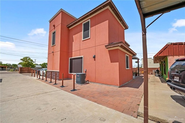 view of property exterior featuring cooling unit