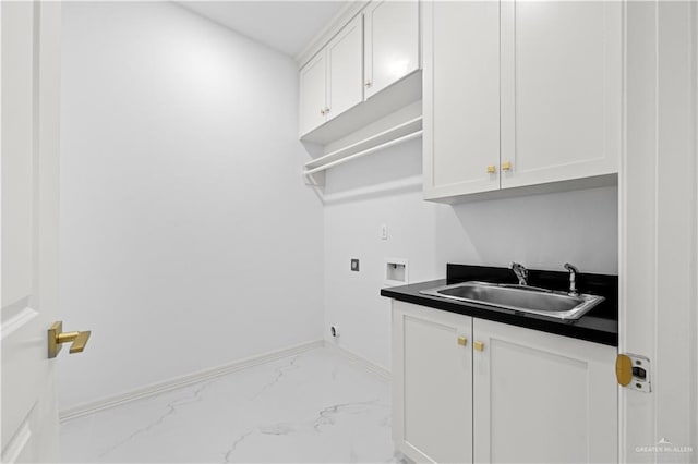 washroom featuring cabinets, sink, hookup for a washing machine, and hookup for an electric dryer