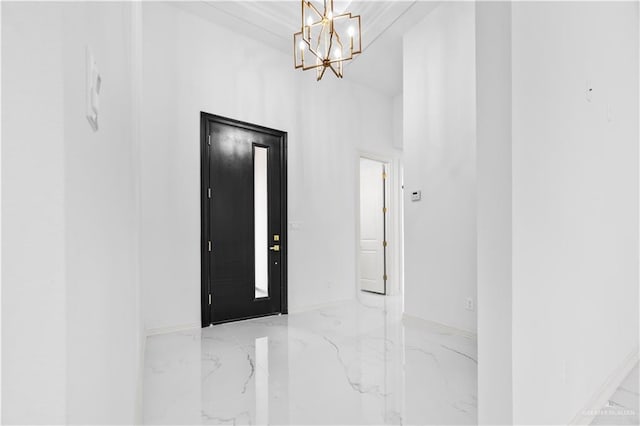 foyer featuring a notable chandelier