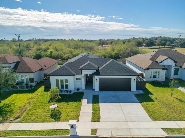 ranch-style home featuring a front lawn and a garage