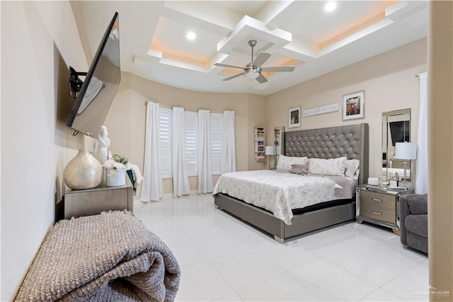 tiled bedroom featuring ceiling fan and coffered ceiling