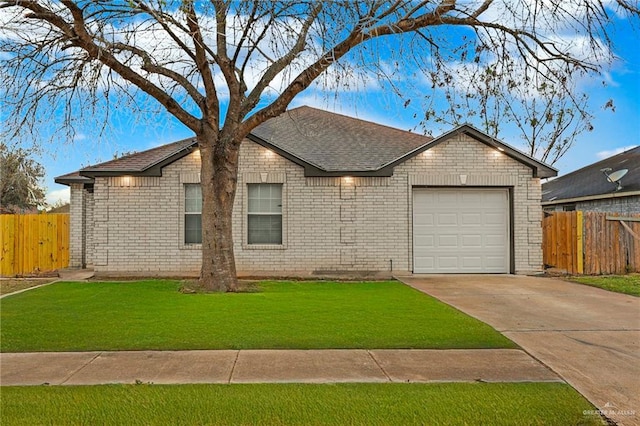 ranch-style home with brick siding, concrete driveway, an attached garage, fence, and a front yard