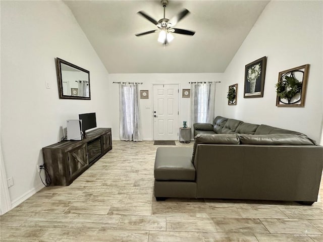 712 Bridget St, Weslaco, TX 78596 - living room featuring a ceiling fan, healthy amount of natural light, and high vaulted ceiling