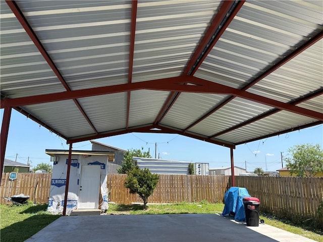 4413 Melody Ln, Edinburg, TX 78542 - view of patio featuring a carport and fence